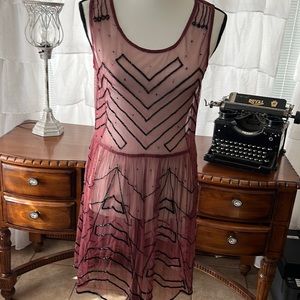 Like NWOT Free people sheer maroon chevron pattern black beaded top! Size M